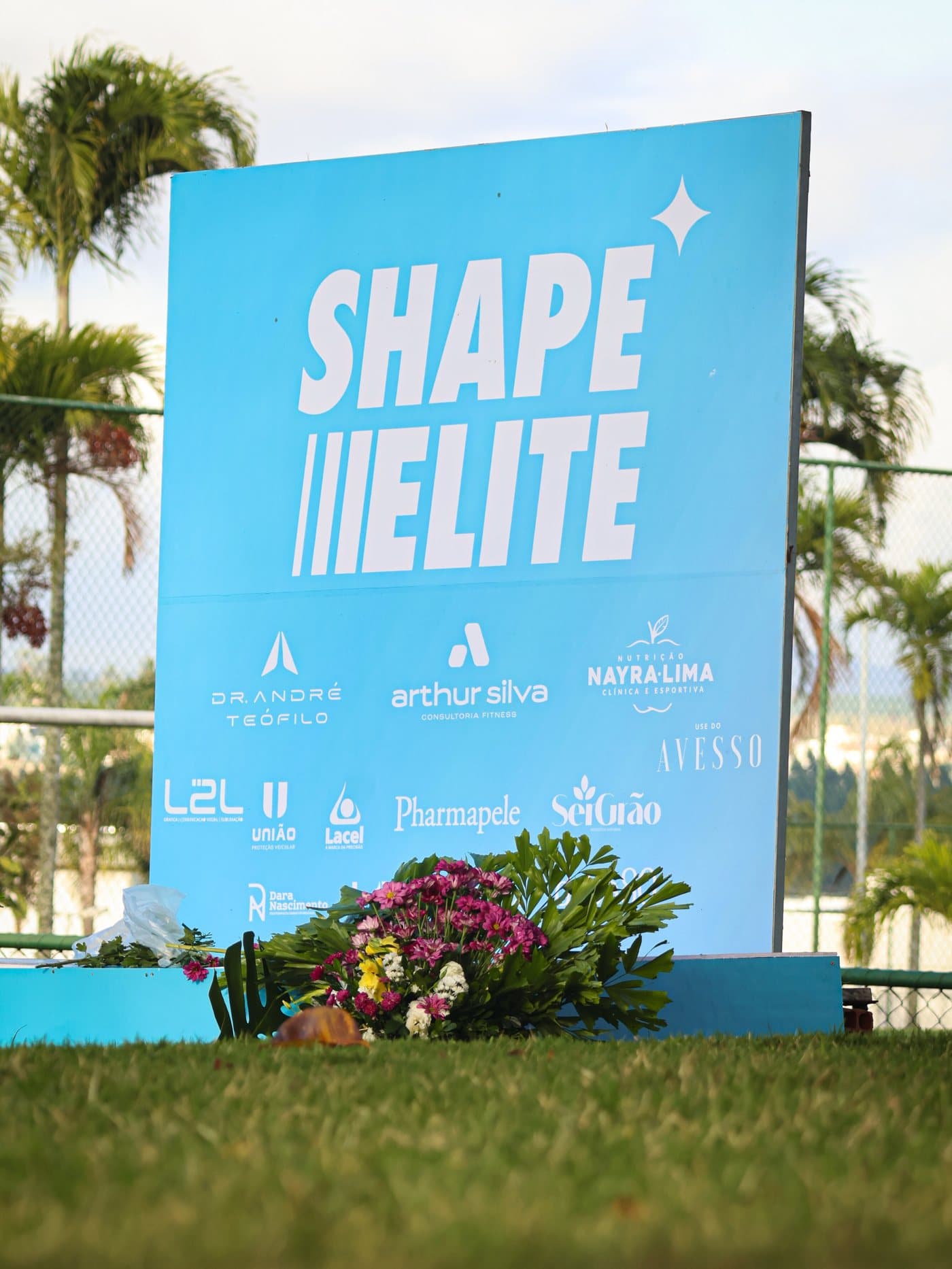 Estrutura do Desafio Shape Elite com a marca Nayra Lima entre os parceiros